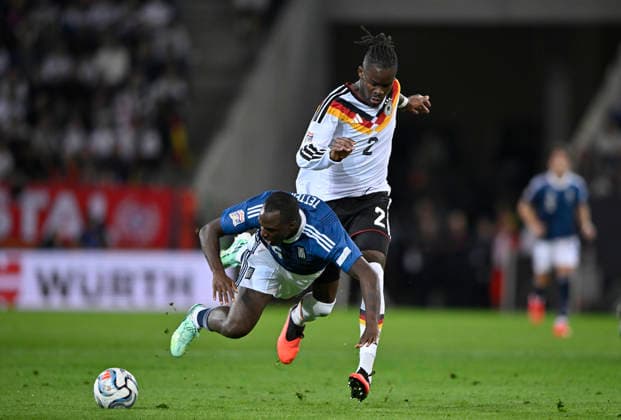 Zweikampf, Aktion Foul Yann Aurel Bisseck GER (02) gegen Andreas Tetteh GRE (16) DFB Laenderspiel Deutschland GER vs Griechenland GRE UEFA Nations League am 27.09.2026 DFL REGULATIONS PROHIBIT ANY USE OF PHOTOGRAPHS AS IMAGE SEQUENCES AND OR QUASI-VIDEO DFB Laenderspiel Deutschland GER vs Griechenland GRE UEFA Nations League
