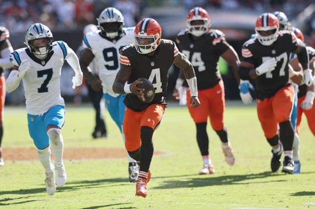 Cleveland Browns Deshaun Watson (4) runs for a fourth quarter first down against the Carolina Panthers at Huntington Bank Field in Cleveland, Ohio on Sunday September 27, 2026. The Browns defeated the Panthers 21-18.  CLE20260927125 AARONxJOSEFCZYK