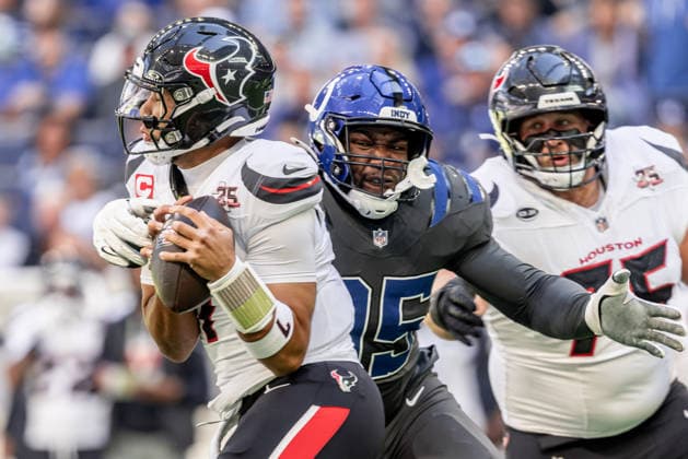 September 27, 2026, Indianapolis, Indiana, U.S: Houston Texans quarterback C.J. Stroud (7) is wrapped up by Indianapolis Colts defensive lineman Adetomiwa Adebawore (95) for a sack during the game between the Houston Texans and the Indianapolis Colts at Lucas Oil Stadium, Indianapolis, Indiana. Indianapolis U.S - ZUMAs304 20260927_zaf_s304_047 Copyright: xScottxStuartx