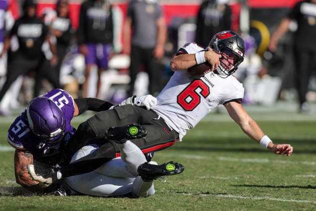 Sep 27, 2026; Tampa, FL, USA; Tampa Bay Buccaneers quarterback Baker Mayfield (6) attempts to get a first down after scrambling during an NFL, American Football Herren, USA football game between the Minnesota Vikings and Tampa Bay Buccaneers at Raymond James Stadium in Tampa, Florida. Mandatory Credit: Taylor McFee-Cal Media NFL 2026: Vikings Vs Buccaneers SEP 27  - ZUMAc04_ 20260927_zma_c04_075 Copyright: xTaylorxMcfeex