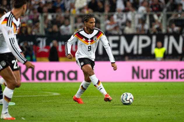 GER, Bayern, Augsburg, Fussball, Deutschland - Griechenland, in der WWK Arena, Augsburg, UEFA Nations League, 2. Spieltag, Gruppenphase 27.09.26, v.l. Kevin Schade (Deutschland, 9), im Angriff, im Portrait, Einzelbild, Freisteller, portrait, headshot, single image, cutout DFL DFB regulations prohibit any use of photographs as image sequences and or quasi-video, Copyright: HMB-Media MichaelxNibel