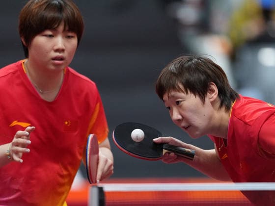 (260928) -- TOYOTA, Sept. 28, 2026 -- Kuai Man Wang Manyu (R) of China compete during the women s doubles semifinals of Table tennis, Tischtennis against Suthasini Sawettabut Orawan Paranang of Thailand at the 20th Asian Games Aichi-Nagoya 2026 in Toyota of Aichi Prefecture, Japan, Sept. 28, 2026. ) (SP)JAPAN-TOYOTA-ASIAN GAMES-TABLE TENNIS-WOMEN S DOUBLES WangxFei 
