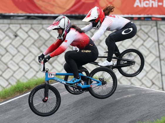 (260928) -- NAGOYA, Sept. 28, 2026 -- Liao Wanyi (L) of China and Hatakeyama Sae of Japan compete during the women final of cycling BMX racing at the 20th Asian Games Aichi-Nagoya 2026 in Nagoya, Japan, Sept. 28, 2026. ) (SP)JAPAN-NAGOYA-ASIAN GAMES-CYCLING BMX RACING-WOMEN-FINAL DengxHua 