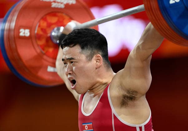(260928) -- NAGOYA, Sept. 28, 2026 -- Ro Kwang Ryol of the Democratic People s Republic of Korea (DPRK) competes during the men s 85kg final of weightlifting at the 20th Asian Games Aichi-Nagoya 2026 in Nagoya, Japan, Sept. 28, 2026. ) (SP)JAPAN-NAGOYA-ASIAN GAMES-WEIGHTLIFTING-MEN S 85KG-FINAL YuxYang 