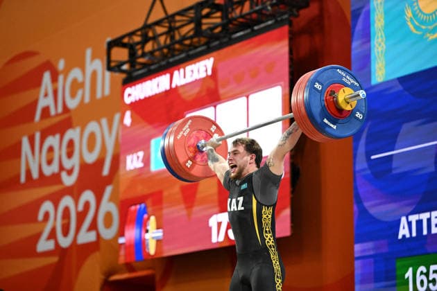 (260928) -- NAGOYA, Sept. 28, 2026 -- Alexey Churkin of Kazakhstan competes during the men s 85kg final of weightlifting at the 20th Asian Games Aichi-Nagoya 2026 in Nagoya, Japan, Sept. 28, 2026. ) (SP)JAPAN-NAGOYA-ASIAN GAMES-WEIGHTLIFTING-MEN S 85KG-FINAL YuxYang 