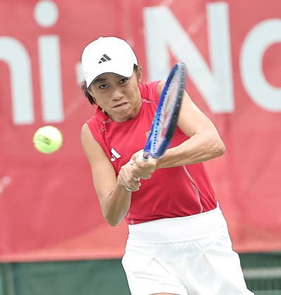 (260928) -- NAGOYA, Sept. 28, 2026 -- Zhang Shuai of China hits a return during the women s singles second round match of tennis against Meshkatolzahra Safi of Iran at the 20th Asian Games Aichi-Nagoya 2026 in Nagoya, Japan, Sept. 28, 2026. ) (SP)JAPAN-NAGOYA-ASIAN GAMES-TENNIS-WOMEN S SINGLES LongxLei 