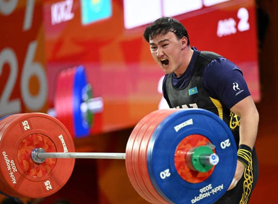 (260928) -- NAGOYA, Sept. 28, 2026 -- Nurgissa Adiletuly of Kazakhstan competes during the men s 95kg final of weightlifting at the 20th Asian Games Aichi-Nagoya 2026 in Nagoya, Japan, Sept. 28, 2026. ) (SP)JAPAN-NAGOYA-ASIAN GAMES-WEIGHTLIFTING-MEN S 95KG-FINAL YuxYang 