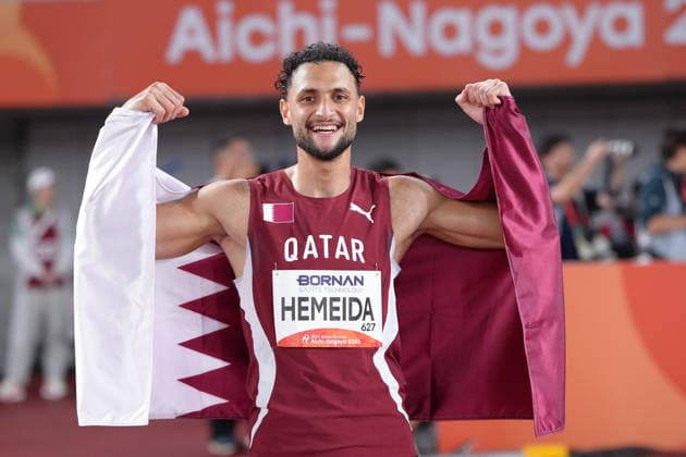 (260928) -- NAGOYA, Sept. 28, 2026 -- Bassem Hemeida of Qatar celebrates after winning the men s 400m hurdles final of Athletics at the 20th Asian Games Aichi-Nagoya 2026 in Nagoya, Japan, Sept. 28, 2026. ) (SP)JAPAN-NAGOYA-ASIAN GAMES-ATHLETICS-MEN S 400M HURDLES-FINAL LuoxYuan 