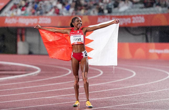 (260928) -- NAGOYA, Sept. 28, 2026 -- Winfred Yavi of Bahrain celebrates after the women s 5000m final match of Athletics at the 20th Asian Games Aichi-Nagoya 2026 in Nagoya, Japan, Sept. 28, 2026. ) (SP)JAPAN-NAGOYA-ASIAN GAMES-ATHLETICS-WOMEN S 5000M LuixSiuxWai 