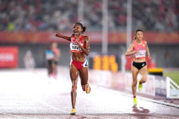 (260928) -- NAGOYA, Sept. 28, 2026 -- Winfred Yavi of Bahrain reacts after the women s 5000m final match of Athletics at the 20th Asian Games Aichi-Nagoya 2026 in Nagoya, Japan, Sept. 28, 2026. ) (SP)JAPAN-NAGOYA-ASIAN GAMES-ATHLETICS-WOMEN S 5000M LuixSiuxWai 