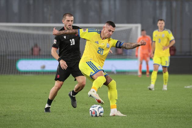 Oleksandr Zubkov of Ukraine challenges Giorgi Chakvetadze of Georgia for the ball during the UEFA Nations League match between Georgia and Ukraine at the The Boris Paitchadze Dinamo Arena in Tbilisi, Georgia, on September 28, 2026. Tbilisi Dinamo Arena named after Boris Paichadze, Akaki Tsereteli Avenue, Didube, Tbilisi, 0154, Georgia Georgia Copyright: xArturxStabulnieksx 1J7A1022