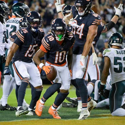 Chicago Bears wide receiver Luther Burden III (10) celebrates scoring a touchdown aPhiladelphia Eagles in the first quarter against the Philadelphia Eagles during a game at Soldier Field in Chicago on Monday, September 28, 2026.  CHI20260928 MARKxBLACK