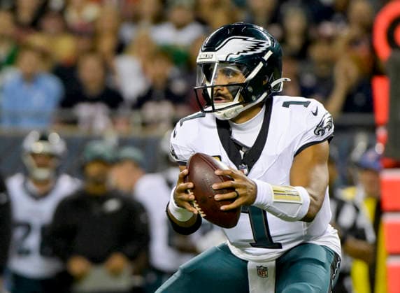 Philadelphia Eagles quarterback Jalen Hurts (1) takes the snap against the Chicago Bears during a game at Soldier Field in Chicago on Monday, September 28, 2026. Bears defeated the Eagles 27-7.  CHI20260928125 MARKxBLACK