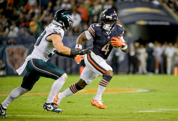 Chicago Bears running back D Andre Swift (4) runs the ball against the Philadelphia Eagles during the first half at Soldier Field in Chicago on Monday, September 28, 2026. Bears defeated the Eagles 27-7.  CHI20260928135 MARKxBLACK