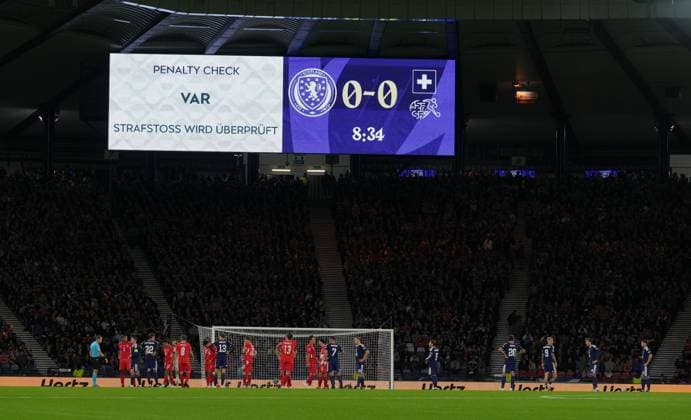 VAR check for possible penalty kick to Switzerland after Jack Hendry of Scotland fouled Johan Manzambi of Switzerland on the edge of the Scotland penalty area. Scotland v Switzerland, Football, UEFA Nation s League, Group B1, Hampden Park, Glasgow, UK, Hampden Park, Glasgow, Scotland, Scotland, UK - 29 Sep 2026Glasgow Hampden Park Scotland United Kingdom Copyright: xStuartxWallace Shutterstockx 17176216ac