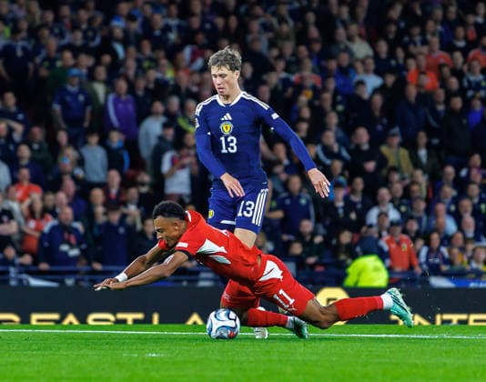 29.09.2026 Scotland v Switzerland, UEFA Nations League, League Stage : Jack Hendry brings down Dan Ndoye and recives a red card as a result  Copyright: xKennyxRamsay.Scotlandx NINTCHDBPICT001112139964