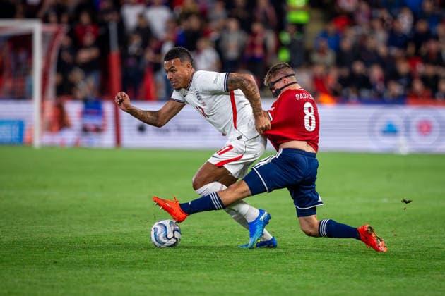 CZECHIA - ENGLAND Morgan Rogers of England and Chelsea and Michal Sadilek of Czechia and SK Slavia Praha during UEFA Nations League - League A - Group A3 - Matchday 2 - football match between Czechia and England. Fortuna Arena, Eden, Stadion, Prague, Czechia September 29, 2026. Photo by Branislav Racko Copyright: xx 080A5680
