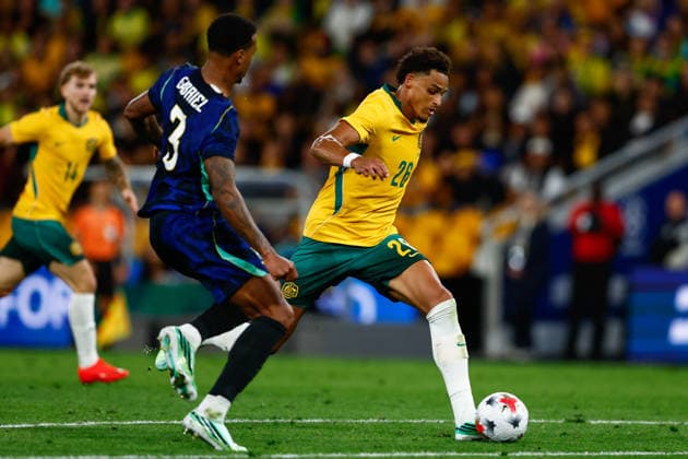 SOCCER AUSTRALIA BRAZIL, Tete Yengi of Australia and Gabriel Magalhaes of Brazil compete for the ball during the Queensland Football Series International Friendly, Länderspiel, Nationalmannschaft match between the Socceroos and Brazil at Suncorp Stadium in Brisbane, Tuesday, September 29, 2026. ( NO ARCHIVING, EDITORIAL USE ONLY  Copyright: xRUSSELLxFREEMANx 20260930192237323637