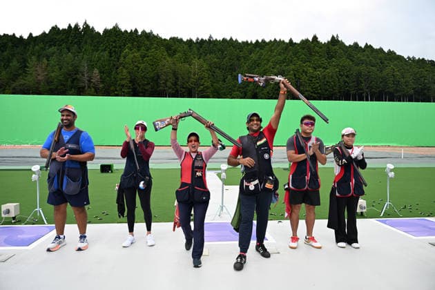 (260930) -- TOYOTA, Sept. 30, 2026 -- First placed Neeru (3rd R) and Kynan Chenai (3rd L) of team India celebrate after the trap mixed team final of shooting at the 20th Asian Games Aichi-Nagoya 2026 in Toyota of Aichi Prefecture, Japan, Sept. 30, 2026. ) (SP)JAPAN-TOYOTA-ASIAN GAMES-SHOOTING-TRAP MIXED TEAM-FINAL LiuxLei 
