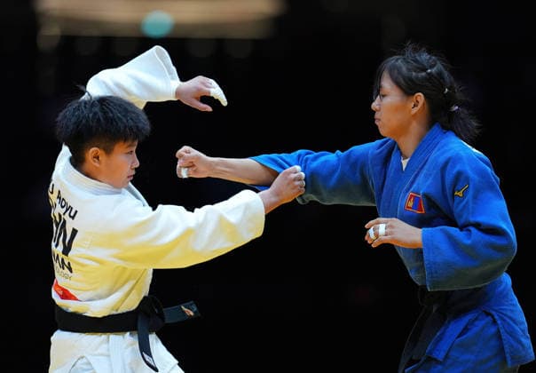 (260930) -- NAGOYA, Sept. 30, 2026 -- Xu Aoyu (L) of China competes against Uranzaya Bayanmunkh of Mongolia during the Women s -52kg bronze medal match of Judo at the 20th Asian Games Aichi-Nagoya 2026 in Nagoya, Japan, Sept. 30, 2026. ) (SP)JAPAN-NAGOYA-ASIAN GAMES-JUDO-WOMEN-52KG CheongxKamxKa 