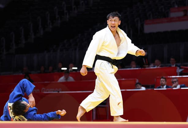 (260930) -- NAGOYA, Sept. 30, 2026 -- Xue Ziyang (R) of China celebrates victory over Gusman Kyrgyzbayev of Kazakhstan after the Men s -66kg bronze medal match of Judo at the 20th Asian Games Aichi-Nagoya 2026 in Nagoya, Japan, Sept. 30, 2026. ) (SP)JAPAN-NAGOYA-ASIAN GAMES-JUDO-MEN-66KG YaoxQilin 