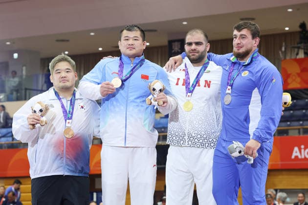 (L-R) KIM Minseok (KOR), MENG Lingzhe (CHN), MIRZAZADEH Amin (IRI), TSITSUASHVILI Rafael (UZB), SEPTEMBER 30, 2026 - Wrestling : Men s Greco-Roman 130kg Medal Ceremony at Nagoya City Inae Sports Center during the Asian Games Aichi-Nagoya 2026 in Aichi, Japan.  aflo_352156146 KenichiroxOganex