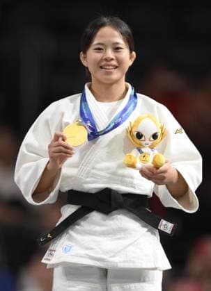 Aichi-Nagoya Asian Games: Judo Japan s Mitsuki Kondo poses after winning the Aichi-Nagoya Asian Games women s judo 48-kilogram gold at Aichi International Arena in Nagoya, central Japan, on Sept. 30, 2026.  A14AA0005629478P