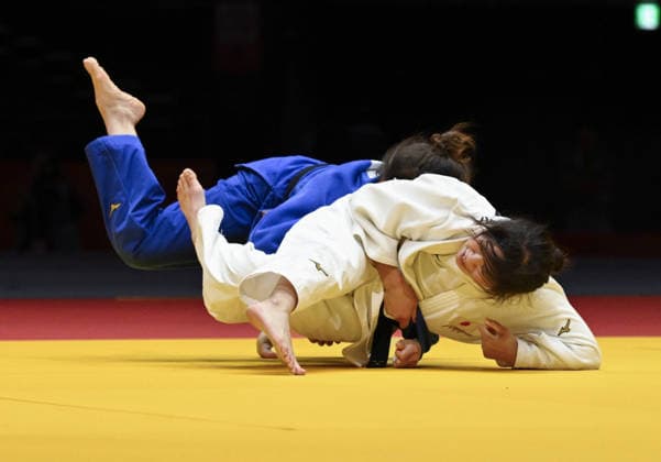 Aichi-Nagoya Asian Games: Judo Japan s Mitsuki Kondo (white) competes against Abiba Abuzhakynova of Kazakhstan in the Aichi-Nagoya Asian Games women s judo 48-kilogram final at Aichi International Arena in Nagoya, central Japan, on Sept. 30, 2026.  A14AA0005629481P