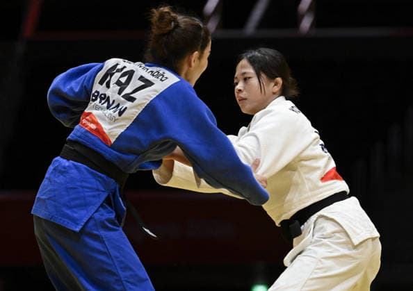 Aichi-Nagoya Asian Games: Judo Japan s Mitsuki Kondo (white) competes against Abiba Abuzhakynova of Kazakhstan in the Aichi-Nagoya Asian Games women s judo 48-kilogram final at Aichi International Arena in Nagoya, central Japan, on Sept. 30, 2026.  A14AA0005629482P