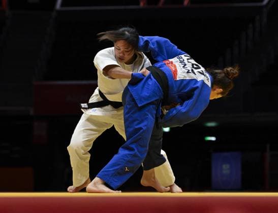 Aichi-Nagoya Asian Games: Judo Japan s Mitsuki Kondo (white) competes against Abiba Abuzhakynova of Kazakhstan in the Aichi-Nagoya Asian Games women s judo 48-kilogram final at Aichi International Arena in Nagoya, central Japan, on Sept. 30, 2026.  A14AA0005629484P