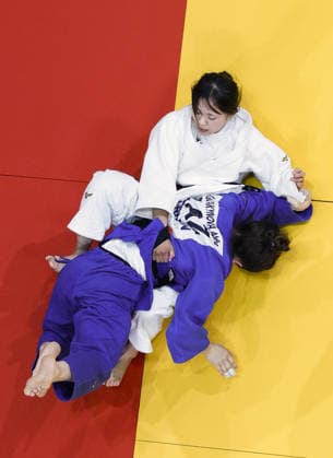 Aichi-Nagoya Asian Games: Judo Japan s Mitsuki Kondo (white) competes against Abiba Abuzhakynova of Kazakhstan in the Aichi-Nagoya Asian Games women s judo 48-kilogram final at Aichi International Arena in Nagoya, central Japan, on Sept. 30, 2026.  A14AA0005629485P