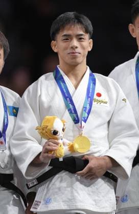 Aichi-Nagoya Asian Games: Judo Japan s Hayato Kondo poses after winning the Aichi-Nagoya Asian Games men s judo 60-kilogram gold at Aichi International Arena in Nagoya, central Japan, on Sept. 30, 2026.  A14AA0005629493P