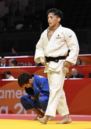 Aichi-Nagoya Asian Games: Judo Japan s Hayato Kondo (white) is pictured after beating Yeldos Smetov of Kazakhstan in the Aichi-Nagoya Asian Games men s judo 60-kilogram final at Aichi International Arena in Nagoya, central Japan, on Sept. 30, 2026.  A14AA0005629494P