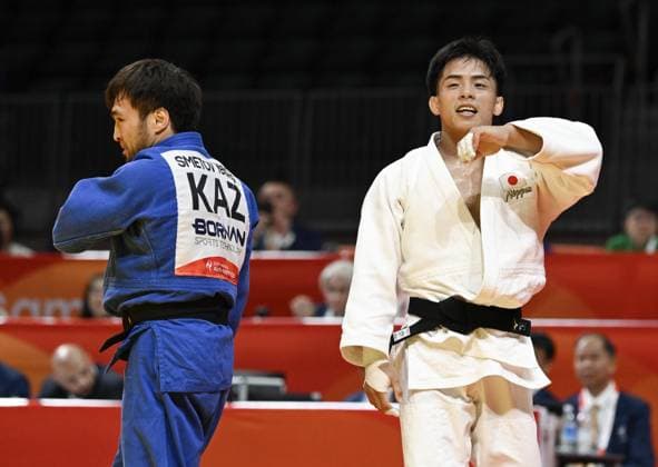 Aichi-Nagoya Asian Games: Judo Japan s Hayato Kondo (white) reacts after beating Yeldos Smetov of Kazakhstan in the Aichi-Nagoya Asian Games men s judo 60-kilogram final at Aichi International Arena in Nagoya, central Japan, on Sept. 30, 2026.  A14AA0005629496P