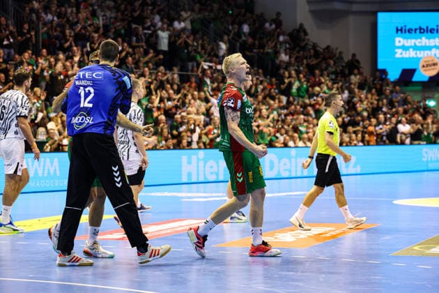 Magnus Saugstrup (SC Magdeburg,23) und Torwart Matej Mandic (SC Magdeburg,12) - Handball Bundesliga Saison 2026-2027 SC Magdeburg vs. THW Kiel in der GETEC Arena in Magdeburg - Aktion,Handball,Deutschland,30.09.2026