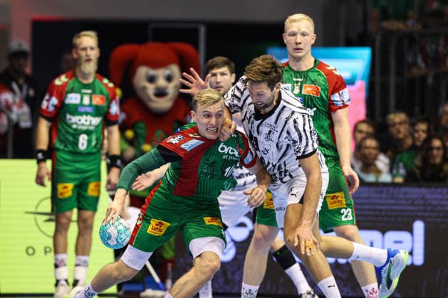 Gisli Kristjansson (SC Magdeburg,10) gegen Harald Reinkind (THW Kiel,6) - Handball Bundesliga Saison 2026-2027 SC Magdeburg vs. THW Kiel in der GETEC Arena in Magdeburg - Aktion,Handball,Deutschland,30.09.2026