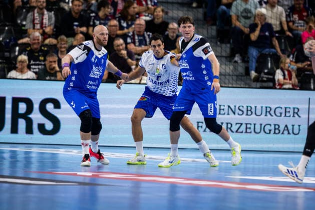 FLENSBURG, GERMANY - SEPTEMBER 30: Arnar Freyr Arnarsson (SG Flensburg-Handewitt, 41), Adrian Figueras (Fraikin BM. Granollers, 13), Lasse Kjaer Moller (SG Flensburg-Handewitt, 64) during the EHF European League match between SG Flensburg-Handewitt vs Fraikin BM. Granollers at GGW Arena on matchday 1 of the Group Matches Group E on September 30, 2026 in Flensburg, Germany. Schleswig-Holstein Germany Copyright: xMarioxM.xKobergx