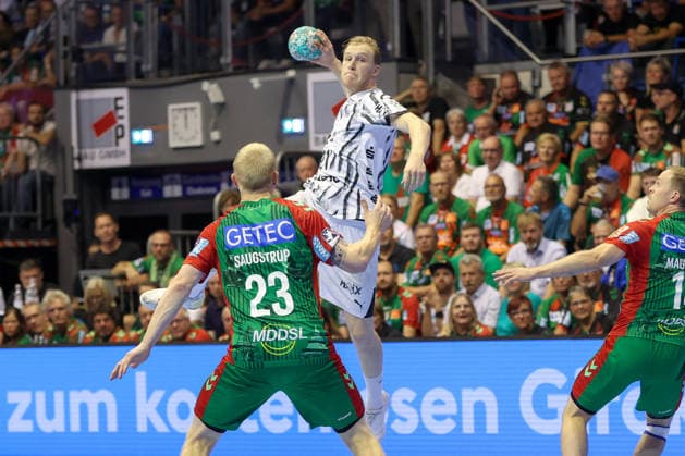 30.09.2026, xgox, Handball Opel HBL, SC Magdeburg - THW Kiel emspor, v.l. Eric Johansson (Kiel, 21) wirft Tor, Torschuetze, erzielt Tor, Treffer, scores the goal Magdeburg