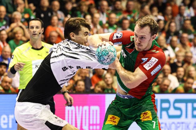 Felix Claar (SC Magdeburg,7) gegen Julian Köster (THW Kiel,7) - Handball Bundesliga Saison 2026-2027 SC Magdeburg vs. THW Kiel in der GETEC Arena in Magdeburg - Aktion,Handball,Deutschland,30.09.2026