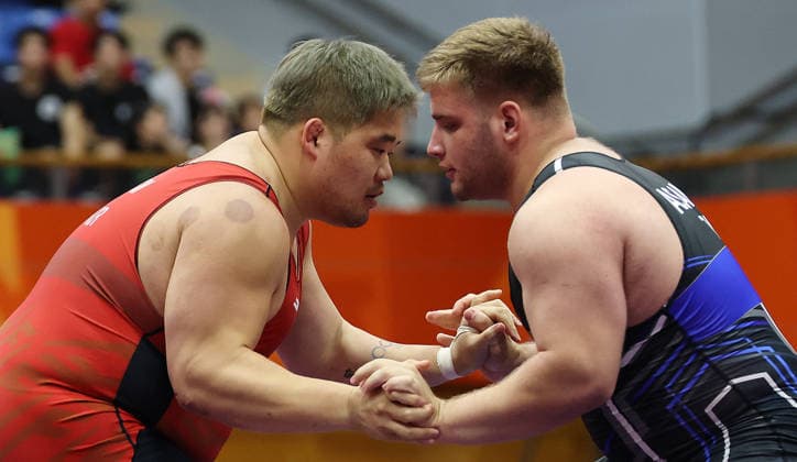 S. Korea s Kim Min-seok grabs bronze in wrestling at Asian Games S. Korea s Kim Min-seok grabs bronze in wrestling at Asian Games Kim Min-seok (L) of South Korea competes against Aslan Agadadayev of Turkmenistan during the bronze medal match of the men s wrestling 130kg Greco-Roman event at the Asian Games at the City Inae Sports Center in Nagoya, Aichi Prefecture, central Japan, on Sept. 30, 2026. Kim won the match 7-2 to win three consecutive Asian Games bronze medals. (Yonhap) 2026-10-01 07:07:33 <Copyright ¨Ï 1980-2026 YONHAPNEWS AGENCY. .> ÀÏº» ÀÏº» EDITORIAL USE ONLY  Copyright: xx Korea s ???x yonphotos257221