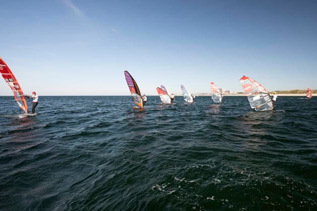 PWA - Citroen - World Windsurfing Tour Sylt 2026 - Tag 5 - Slalom Foil Men; Sylt Westerland, 30.09.2026 Nico Prien (Slalom Foil Men, Germany, GER-7); Scotty Stallman (Slalom Foil Men, England, GBR-68); Noah Vinther (Slalom Foil Men, Denmark, DEN-7777); PWA - Citroen - World Windsurfing Tour Sylt 2026 - Tag 5 - Slalom Foil Men am 30.09.2026 vor dem Brandenburger Strand - Motorboot auf Sylt Westerland (Deutschland). Copyright: xBEAUTIFULxSPORTS AndreasxDickx