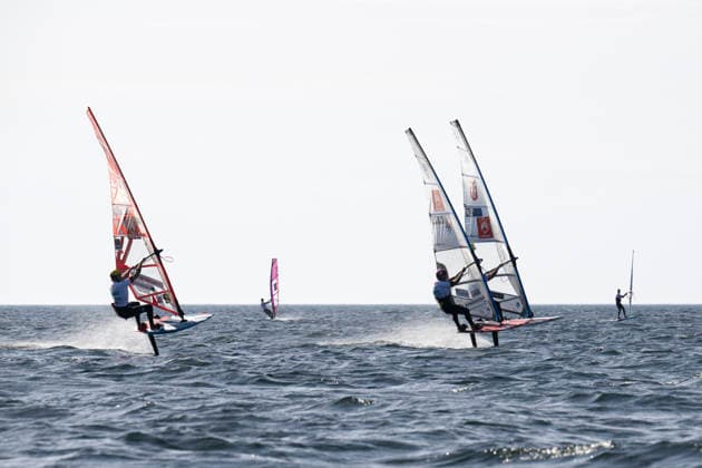 PWA - Citroen - World Windsurfing Tour Sylt 2026 - Tag 5 - Slalom Foil Men; Sylt Westerland, 30.09.2026 Pierre Mortefon (Slalom Foil Men, France, F-14); John Soukos (Slalom Foil Men, Greece, GRE-198); PWA - Citroen - World Windsurfing Tour Sylt 2026 - Tag 5 - Slalom Foil Men am 30.09.2026 vor dem Brandenburger Strand - Motorboot auf Sylt Westerland (Deutschland). Copyright: xBEAUTIFULxSPORTS AndreasxDickx