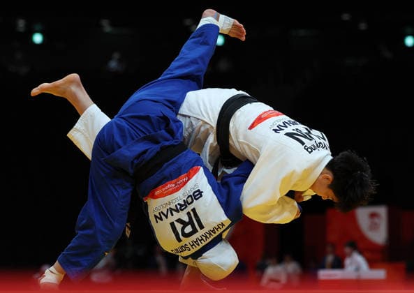 (261001) -- NAGOYA, Oct. 1, 2026 -- Tao Yuying (R) of China competes with Samira Khakkhah of Iran during the women -57kg elimination round of 16 of Judo at the 20th Asian Games Aichi-Nagoya 2026 in Nagoya, Japan, Oct. 1, 2026. ) (SP)JAPAN-NAGOYA-ASIAN GAMES-JUDO-WOMEN -57KG YaoxQilin 