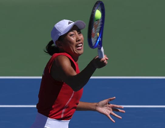 (261001) -- NAGOYA, Oct. 1, 2026 -- Zhang Shuai of China returns the ball during the women s singles semifinals of tennis against Yuliya Putintseva of Kazakhstan at the 20th Asian Games Aichi-Nagoya 2026 in Nagoya, Japan, Oct. 1, 2026. ) (SP)JAPAN-NAGOYA-ASIAN GAMES-TENNIS-WOMEN S SINGLES-SEMIFINALS LixBo 