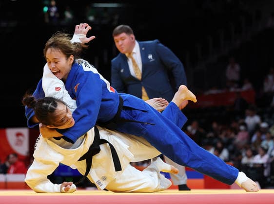 (261001) -- NAGOYA, Oct. 1, 2026 -- Zhang Wen (top) of China competes with Yuan Pei-chun of Chinese Taipei during the women -63kg elimination round of 16 of Judo at the 20th Asian Games Aichi-Nagoya 2026 in Nagoya, Japan, Oct. 1, 2026. ) (SP)JAPAN-NAGOYA-ASIAN GAMES-JUDO-WOMEN -63KG YaoxQilin 