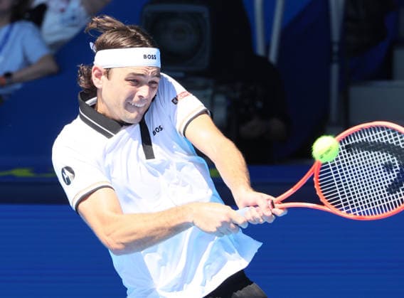 October 1, 2026, Tokyo, Japan - Taylor Fritz of the United States returns the ball against Jaumu Munar of Spain during the first round match of the Japan Open tennis championship at the Ariake Colosseum in Tokyo on Thursday, October 1, 2026. (photo by Yoshio Tsunoda AFLO) Noxthirdxpartyxsales  0868287386st YoshioxTsunodax