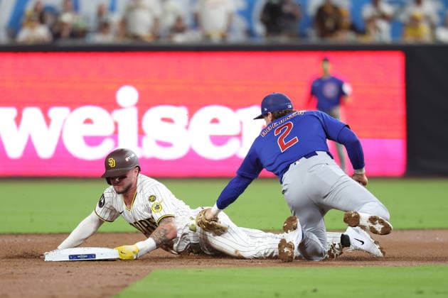 September 30, 2026, San Diego, Ca, USA: The San Diego Padres Jackson Merrill, left, slides safely into second base ahead of the tag from Chicago Cubs infielder Nico Hoerner during the second inning in Game 2 of an N.L. Wild Card series at Petco Park on Wednesday, Sept. 30 2026, in San Diego. Sports News - September 30, 2026  - ZUMAm67_ 0868290835st Copyright: xBrianxCassellax