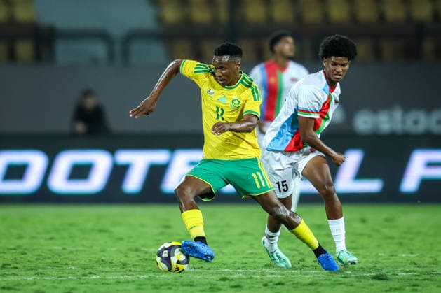 Eritrea v South Africa - CAF Africa Cup Of Nations Qualifiers Yonael Yonas Asmelash of Eritrea battles for possession with Themba Zwane of South Africa during the CAF Africa Cup of Nations qualifier between Eritrea and South Africa at Al Salam Stadium on September 30, 2026. Cairo Egypt  Copyright: xAymanxArefx originalFilename:aref-notitle260930_npuhi.jpg