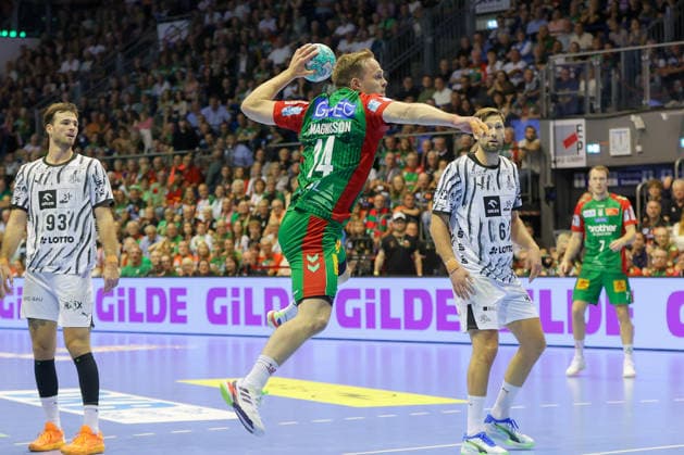 30.09.2026, xgox, Handball - Opel HBL SC Magdeburg - THW Kiel emspor, v.l. Omar Ingi Magnusson (Magdeburg, 14) wirft Tor, Torschuetze, erzielt Tor, Treffer, scores the goal Magdeburg