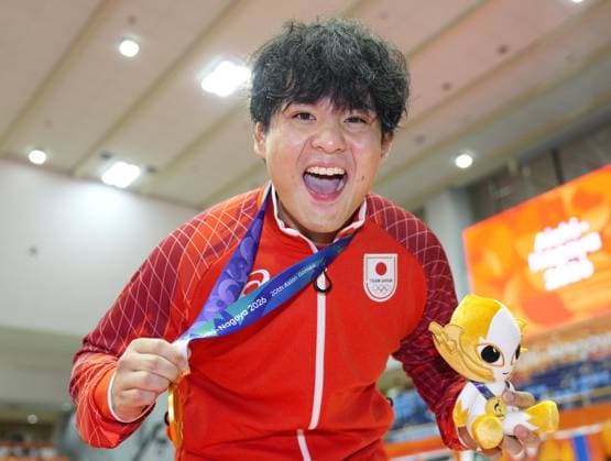 Aichi-Nagoya Asian Games: Wrestling Japan s Yuri Nakazato celebrates after winning the Aichi-Nagoya Asian Games men s wrestling Greco-Roman 97-kilogram gold at Nagoya City Inae Sports Center in Nagoya, central Japan, on Oct. 1, 2026.  A14AA0005629665P